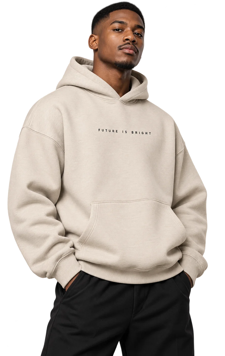 Model wearing The Name hoodie in oatmeal